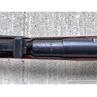 Close-up of the Soviet Izhevsk factory stamp, production year, and serial number on an M44 Mosin-Nagant barrel shank 