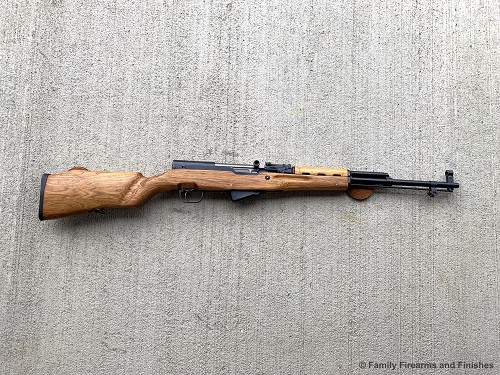 Right-side profile view of a Chinese Norinco Type 56 SKS semi-automatic rifle with wood stock 