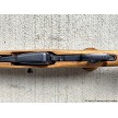 Detailed view of the 10-round fixed magazine and trigger assembly of a Norinco SKS carbine 