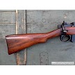 British Enfield No. 4 Mk I sporterized bolt action rifle chambered in .303 British, right side buttstock. 