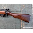 British Enfield No. 4 Mk I sporterized bolt action rifle chambered in .303 British, left side buttstock. 