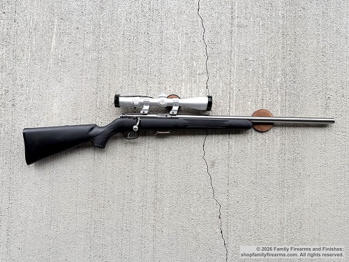Savage 93R17 stainless bolt action rifle with black synthetic stock and Nikon Pro Staff 3-9x40 scope 