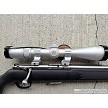 Savage 93R17 stainless bolt action rifle with black synthetic stock and Nikon Pro Staff 3-9x40 scope 