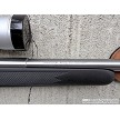 Savage 93R17 stainless bolt action rifle with black synthetic stock and Nikon Pro Staff 3-9x40 scope 