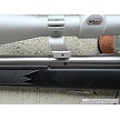 Savage 93R17 stainless bolt action rifle with black synthetic stock and Nikon Pro Staff 3-9x40 scope 