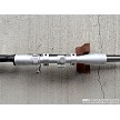 Savage 93R17 stainless bolt action rifle with black synthetic stock and Nikon Pro Staff 3-9x40 scope 