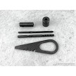 Mosin-Nagant rifle bolt teardown tool shown alongside matching surplus cleaning kit attachments. 