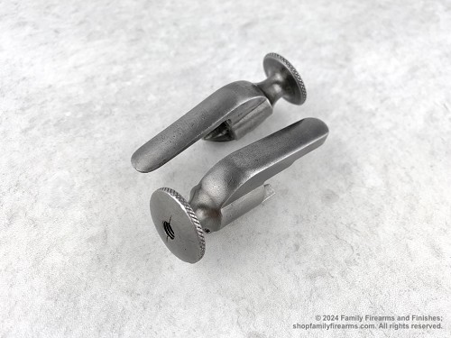 Original military surplus early-cutout Mosin-Nagant rifle bolt cocking piece. 