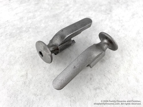 Vintage Soviet military surplus Mosin-Nagant rifle bolt cocking piece with early Izhevsk bow and arrow stamp. 