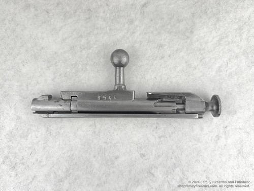 Full view of an original vintage military surplus Russian Tula-marked complete Mosin-Nagant bolt. 