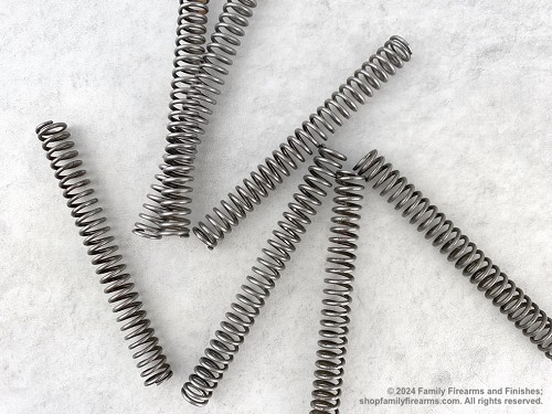 Full-length view of an original coiled steel Mosin-Nagant rifle bolt firing pin spring. 