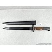 Original Yugoslavian M48 military surplus bayonets displayed next to its matching steel scabbard 