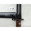 Close-up view of the Cyrillic Preduzece 44 inspection stamp at the base of a surplus Yugo M48 bayonet blade 