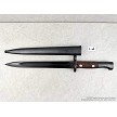Original Yugoslavian M48 military surplus bayonets displayed next to its matching steel scabbard 
