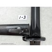 Close-up view of the Cyrillic Preduzece 44 inspection stamp at the base of a surplus Yugo M48 bayonet blade 