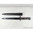Original Yugoslavian M48 military surplus bayonets displayed next to its matching steel scabbard 