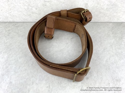 Vintage Cold War surplus leather Mosin-Nagant sling with original leather dog collars. 